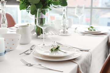 Beautiful table setting in dining room