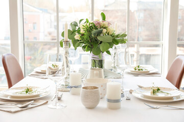 Beautiful table setting in dining room