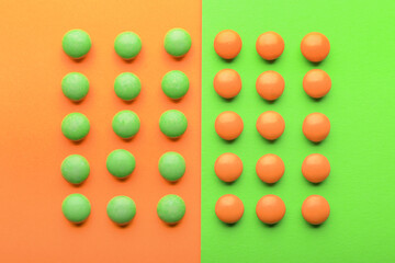 Sweet candies on color background