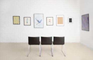 Interior of modern art gallery, blurred view