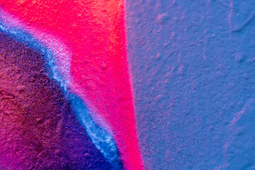 Art under ground. Beautiful street art graffiti background. The wall is decorated with abstract drawings house paint. Modern style urban culture of street youth. Abstract picture on wall