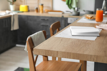 Stylish table in modern kitchen