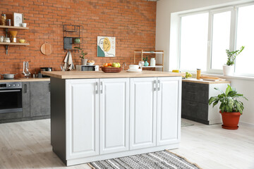 Interior of modern kitchen with stylish table