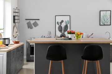 Interior of modern kitchen with stylish table