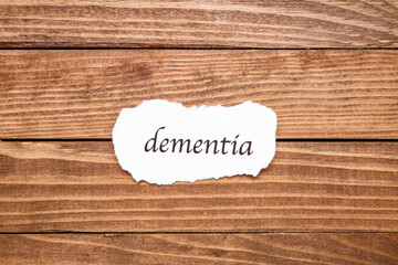 Word DEMENTIA on wooden background