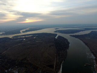 Aerial view of the countryside (drone image).Near river Desna.Winter time.Sunset. Near Kiev,Ukraine