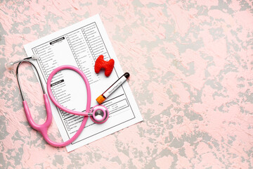 Blood sample in tube with stethoscope, model of thyroid and laboratory test form on color background
