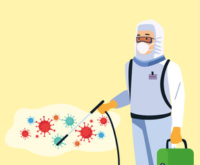biosafety worker with sprayer disinfectant and covid19 particles