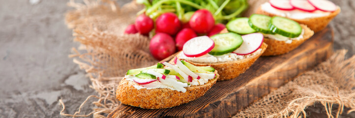 cheese and vegetables sandwiches on a table, selective focus, copy space