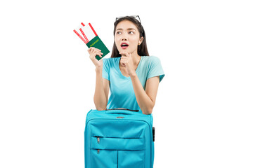 Asian woman with ticket and passport leaning on suitcase