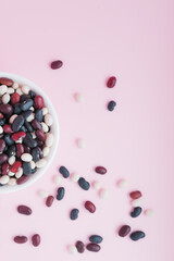 raw beans in a cup on the background