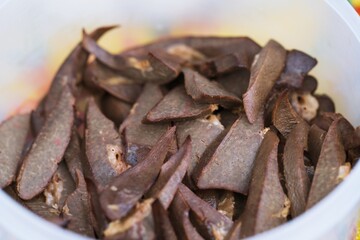 Obraz premium Close up of boiled Pork liver thai street food market
