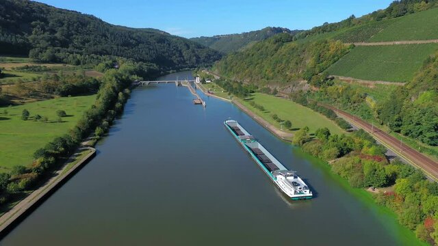 AERIAL WS Barge on Saar River near Serrig / Rhineland-Palatinate, Germany