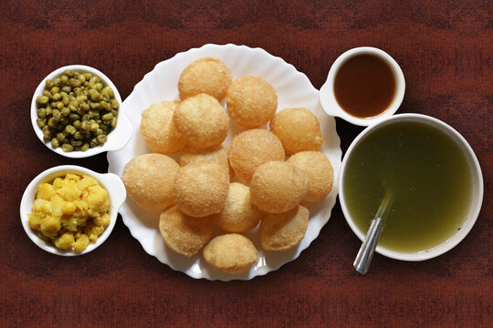 A popular Indian snack called pani puri. Pani puri is a popular food item in India it is also known as puchka or gol gappe. 
