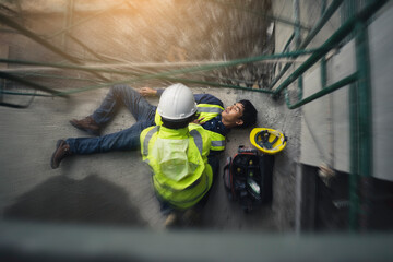 Fototapeta premium Construction worker accident, Accidents at work, Builder accident fall scaffolding to the floor, Safety team help employee accident, Basic first aid training for support accident in site work.
