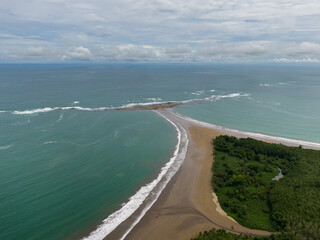 Beautiful aerial view of the majestic whale tale in the beach of the National park Marino Ballena in Costa Rica 