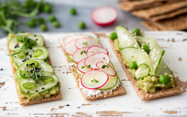 rye bread sandwiches with vegetables and cream cheese