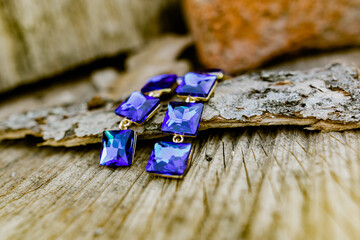 Costume jewelry for a festive day, long earrings with large square blue stones and an ultramarine...