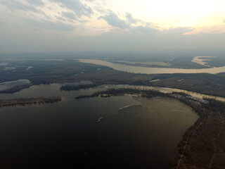Aerial view of the countryside (drone image).Near river Desna.Winter time.Sunset. Kiev,Ukraine