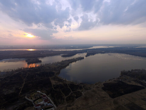 Aerial view of the countryside (drone image).Near river Desna.Winter time.Sunset. Kiev,Ukraine