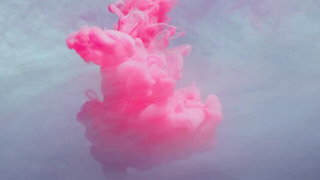 SLO MO CU Blue, pink and gray ink dissolving in water / London, UK