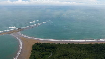 Beautiful aerial view of the majestic whale tale in the beach of the National park Marino Ballena in Costa Rica 
