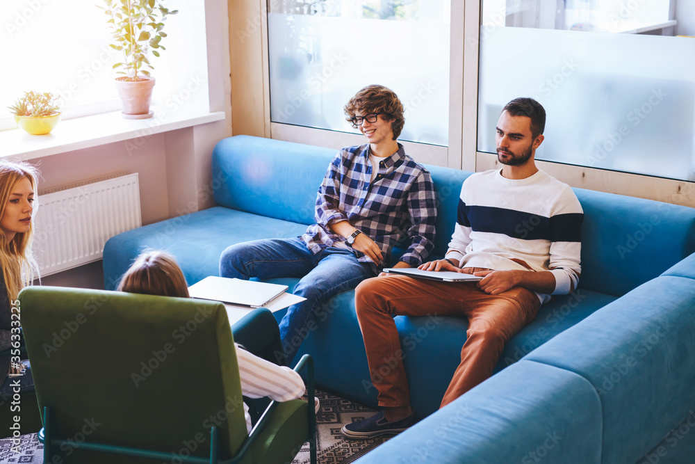 Poster coworking space using modern laptop computer and wireless internet