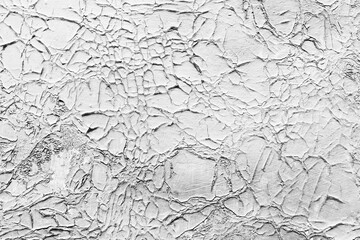Dry cracked paint texture. Peel cracks dry background. Exterior old grunde paint wall.