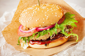 tasty burger on the parchment