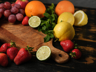 Diet healthy dessert or salad ingredients for cooking  homemade with summer fruits assorted mix on table background