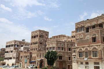 Fototapeta premium Traditional Yemen houses. Sana, which is on the Unesco World Heritage list, has many traditional houses. Houses with several floors are built of bricks.