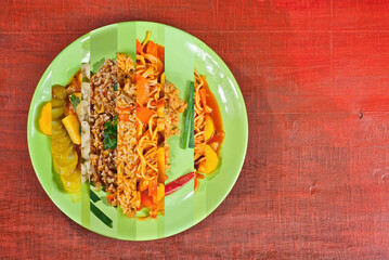 A mixture of many cereals. Assorted different types of dishes on a plate. Designer layout. A plate on a shabby old board. Collage of several photos. All menus in one picture. Mockup. Space for text.