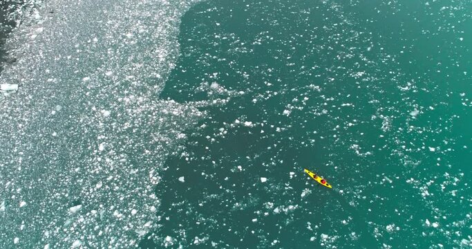 AERIAL MS Kayakers at Yankee Harbor covered with ice floes / Antarctic Peninsula, Antarctica