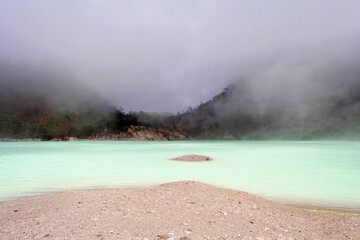 Kawah Putih or White Crater is a famous sulfur rich volcanic crater lake in West Java, Indonesia.