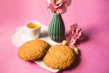 Pastry, cookies, cake, sugar dessert concept on pink background