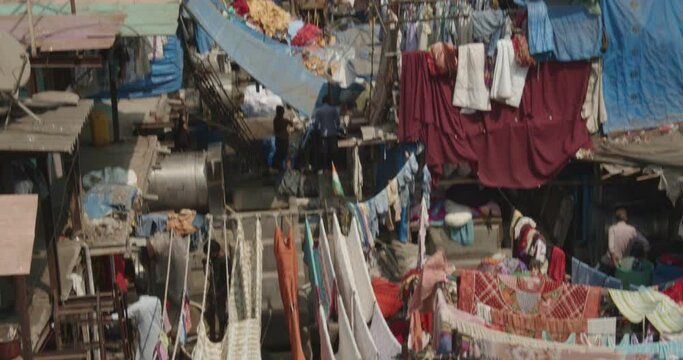 shot of laundry and rows of clothes on the clotheslines.