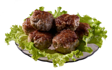 Fried cutlets on a dark plate. lettuce leaves