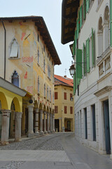 Fototapeta na wymiar The historic Corso Roma in the centre of Spilimbergo in the Udine province of northern Italy 