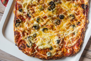 Pizza with halm, mozzarella,meat, cheese 