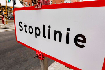 Aalborg, Denmark A stop sign on a street. Stoplinie in Danish means stop line.