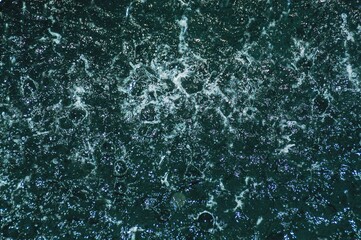 Top view of rain drops falling on the sea during a violent monsoon season