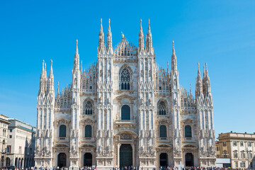 Fototapeta na wymiar Duomo gothic cathedral on square in Milan, Italy
