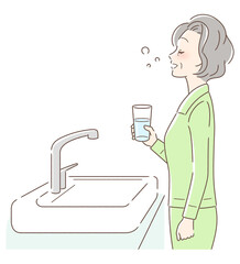 うがいをする女性