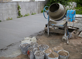 Concrete mixer at a construction site. Concreting of floors