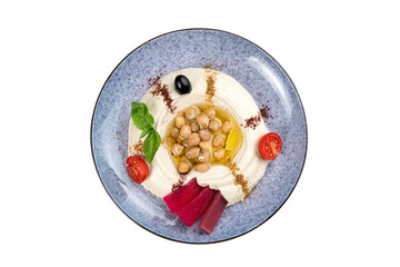 Hummus with tuna on a white plate on a white isolated background.
