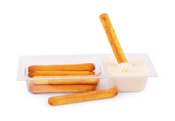 Bread sticks dipped, covered in creamy, isolated on white background