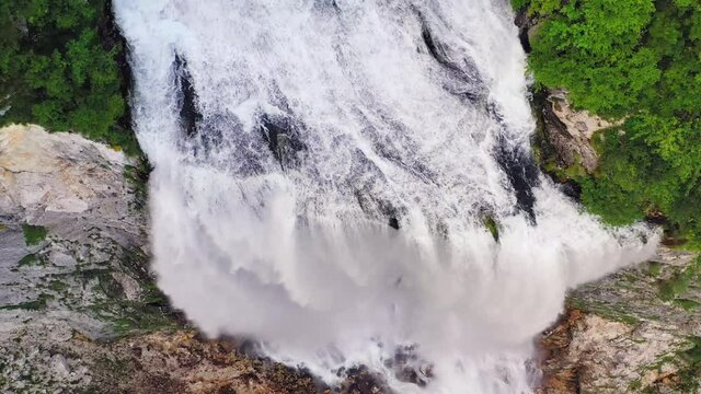 Boka waterfall,  majestic stream come to light on rocky shelf, Triglav