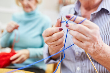 Seniors learn to crochet in a knitting club
