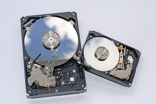 Several disassembled hard drives for the computer, on a white background