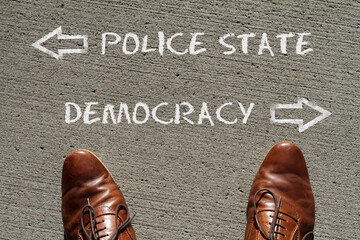 Top view on a man standing in front of the words 